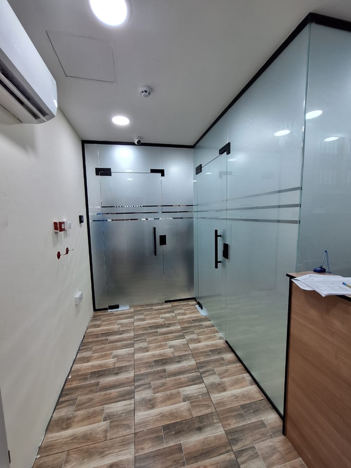 Frosted glass office doors and partition installation